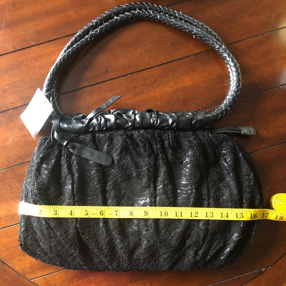 5 for $25. Women’s lace handbag. NWT